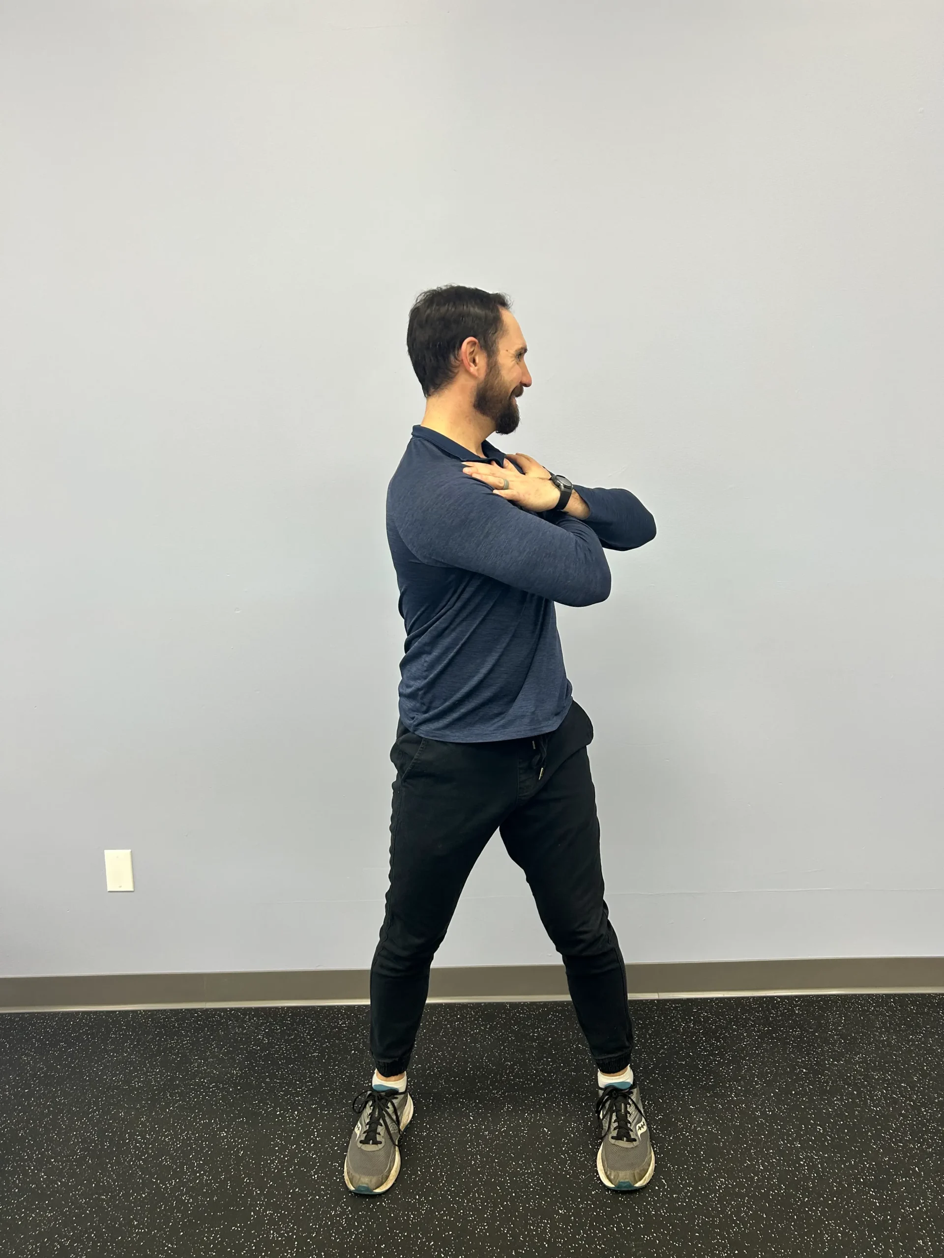 Man demonstrating Trunk Rotation movement.