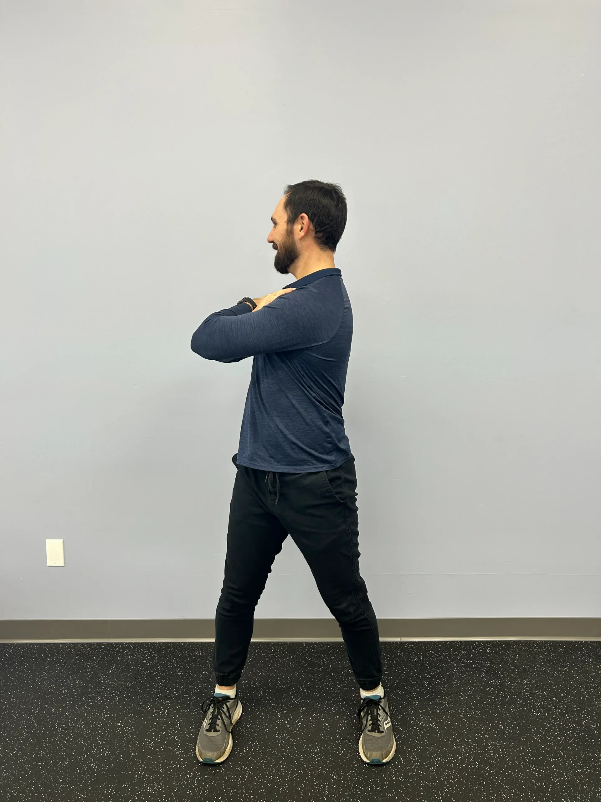 Man demonstrating Trunk Rotation movement.